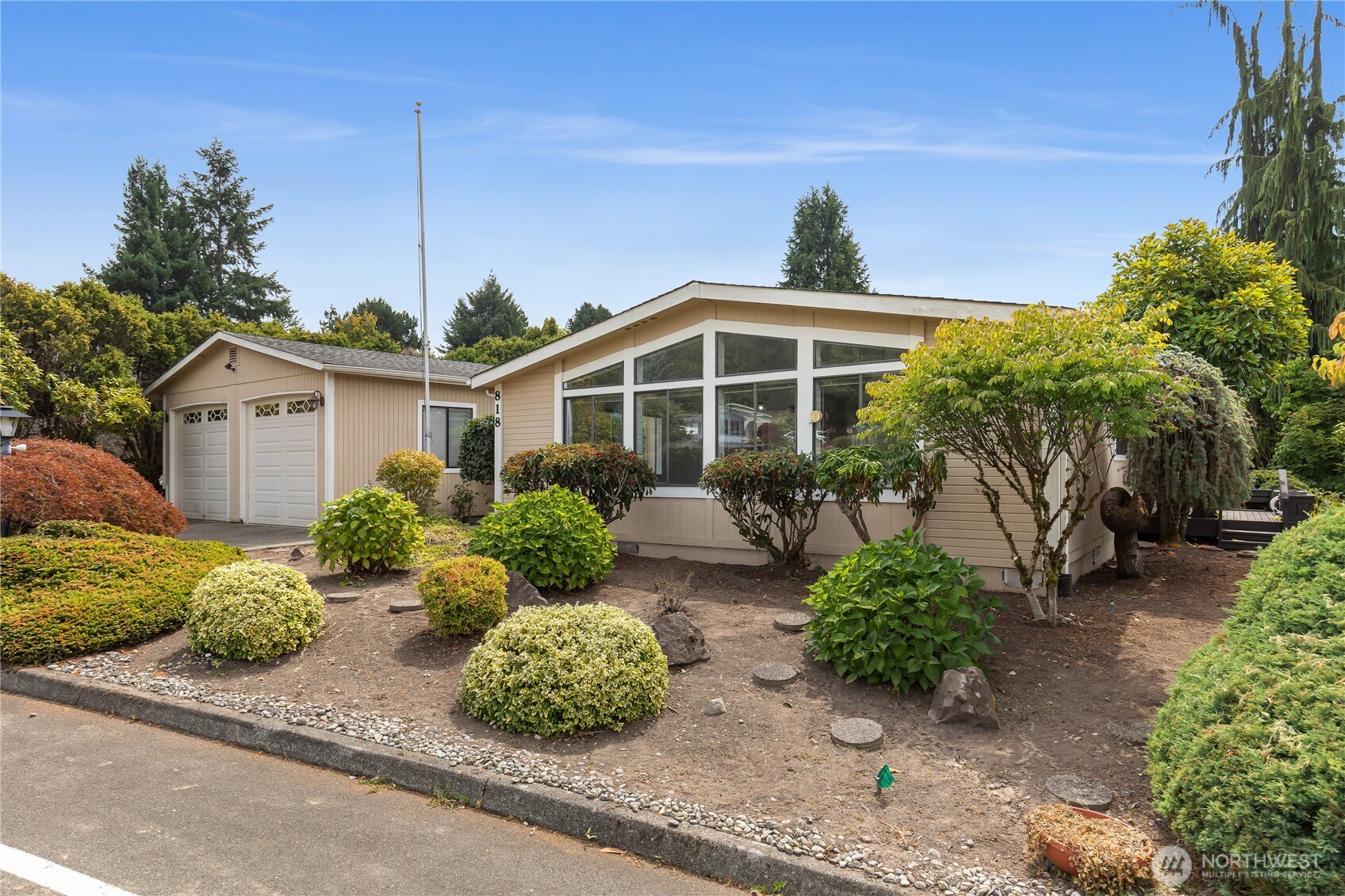 818 243rd Street Southwest Bothell, WA 98021 - Photo 1 of 40 a front view of a house with a yard