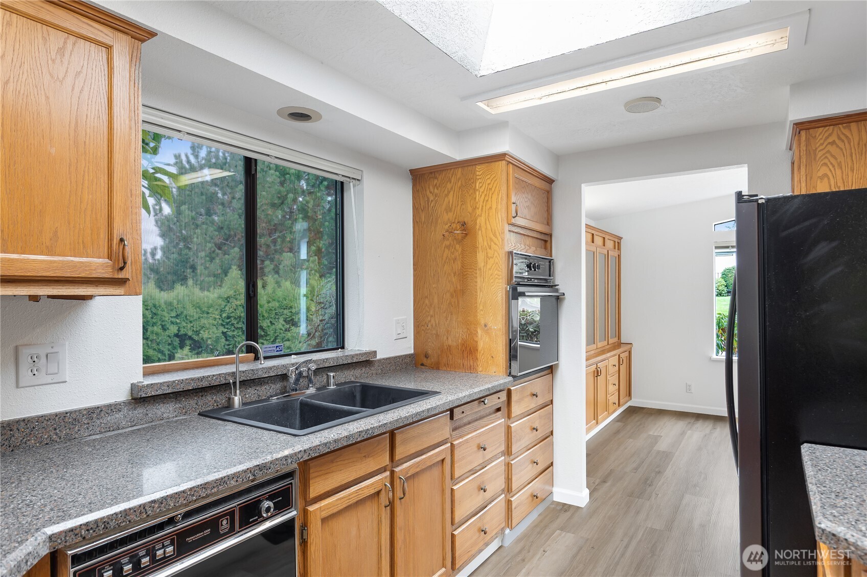 818 243rd Street Southwest Bothell, WA 98021 - Photo 12 of 40 a view of a kitchen with a large window