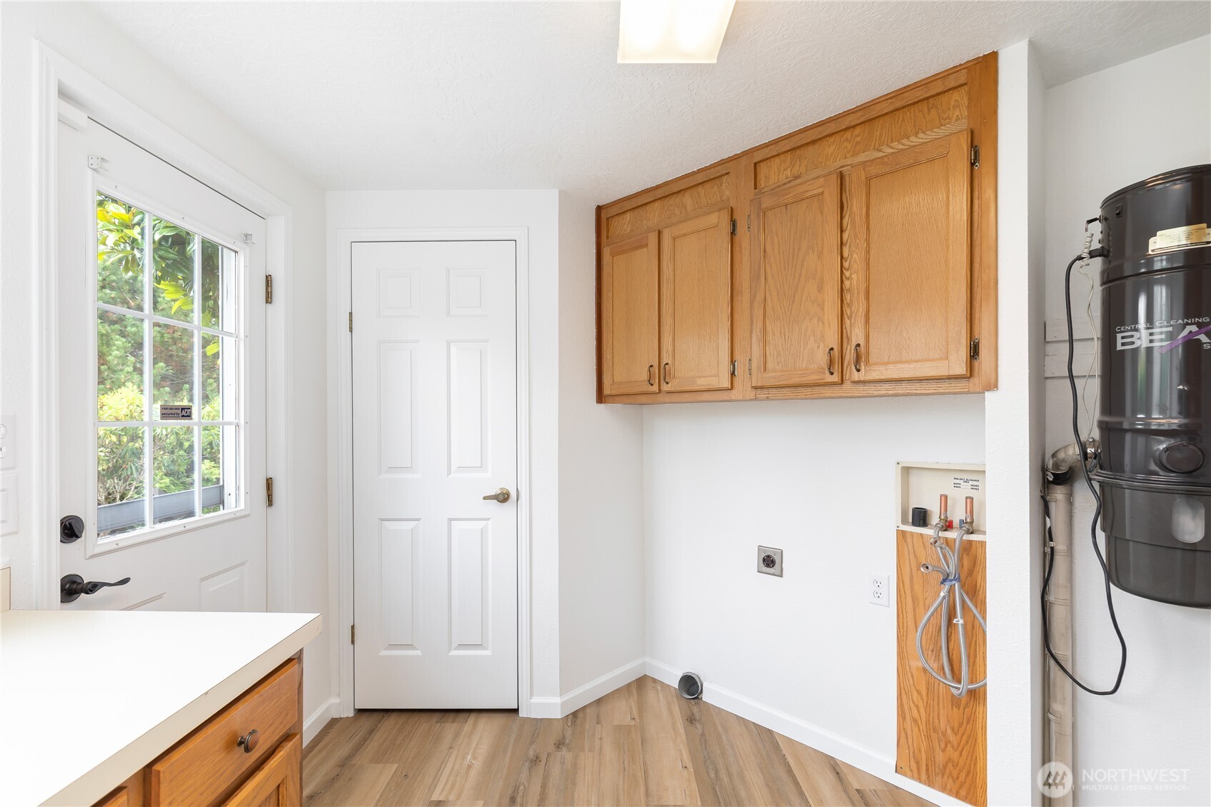 818 243rd Street Southwest Bothell, WA 98021 - Photo 18 of 40 a view of a storage and utility room with a window