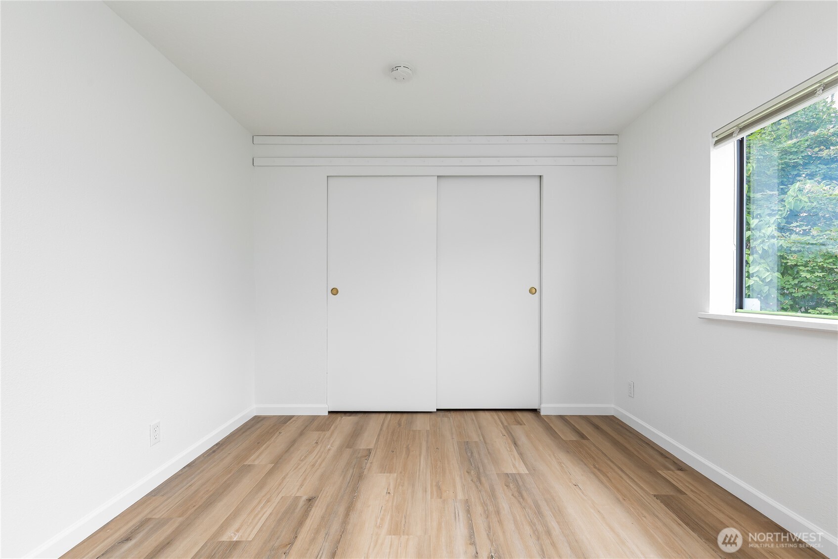 818 243rd Street Southwest Bothell, WA 98021 - Photo 20 of 40 an empty room with a window