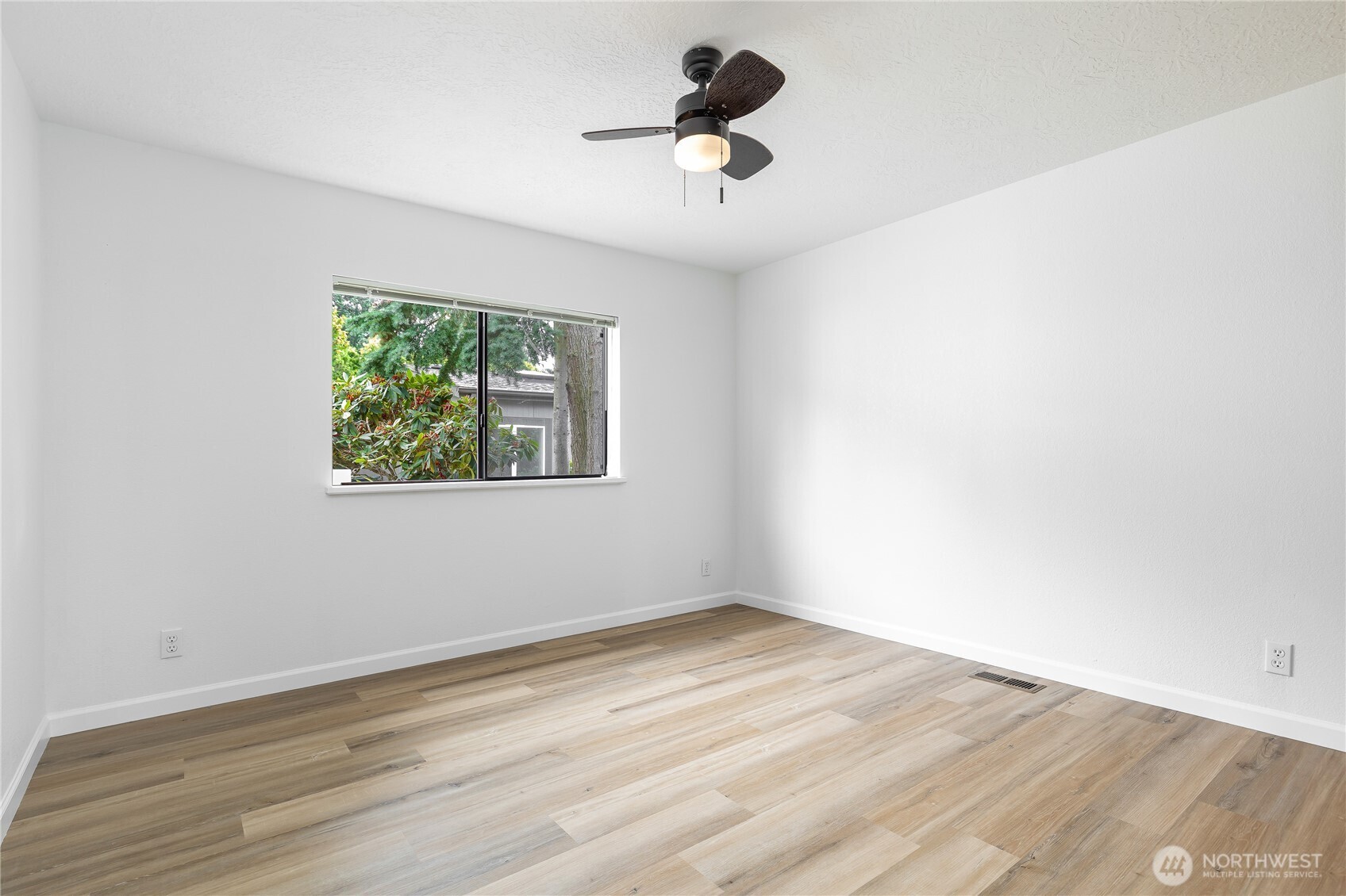 818 243rd Street Southwest Bothell, WA 98021 - Photo 21 of 40 wooden floor in an empty room