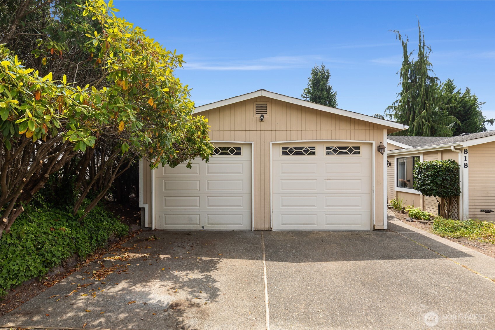 818 243rd Street Southwest Bothell, WA 98021 - Photo 27 of 40 a front view of a house with a garage