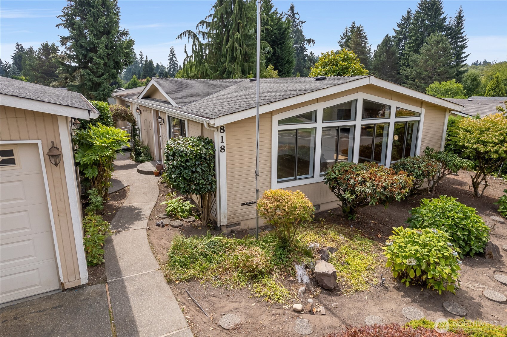 818 243rd Street Southwest Bothell, WA 98021 - Photo 40 of 40 a view of a house with garden