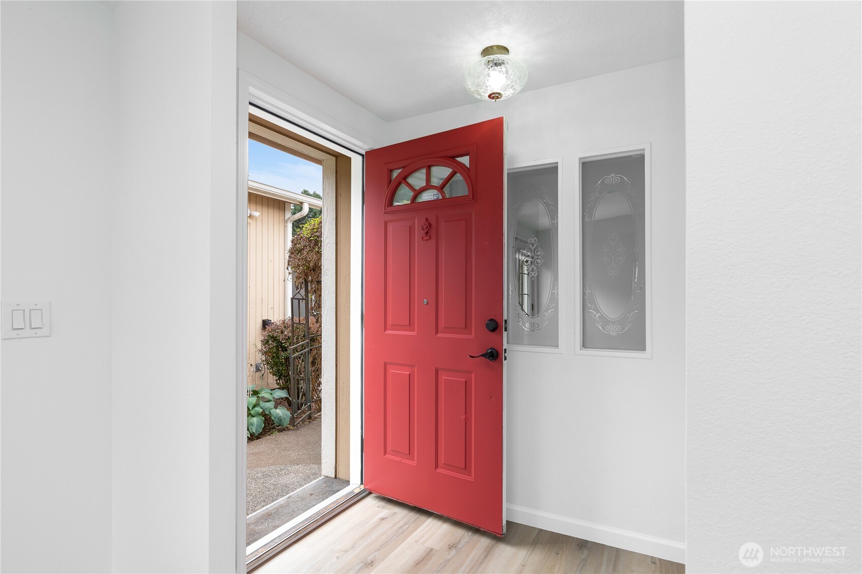 818 243rd Street Southwest Bothell, WA 98021 - Photo 4 of 40 a view of front door with hallway