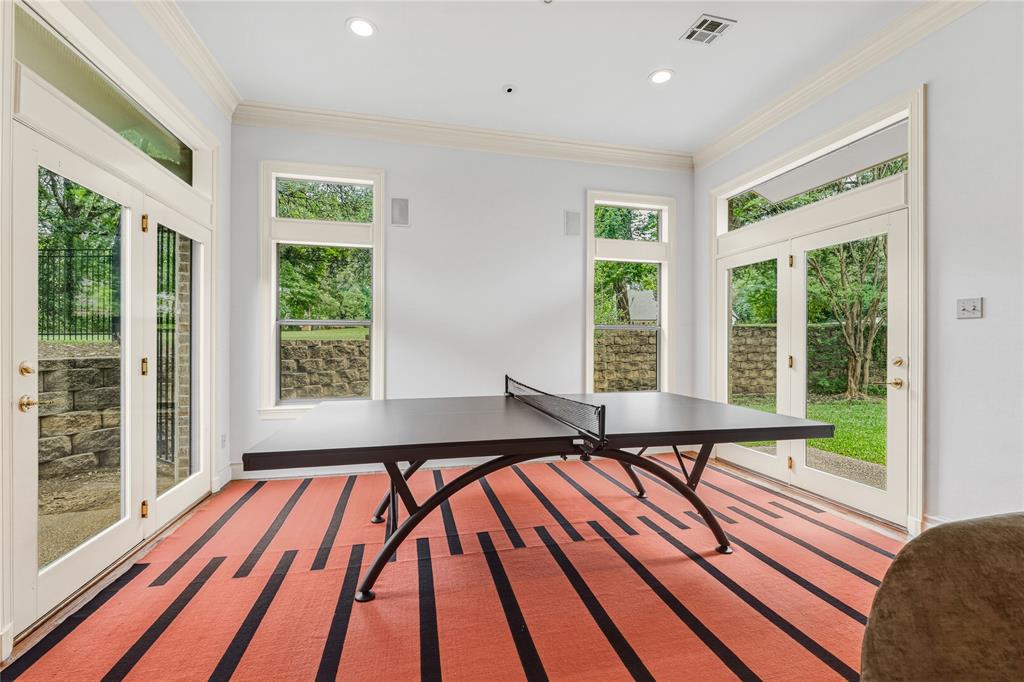 3201 Edward Drive Waco, TX 76708 - Photo 23 of 40 a view of a large room with windows and wooden floor