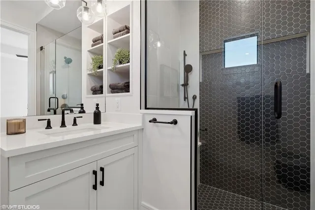 a bathroom with a sink and a mirror
