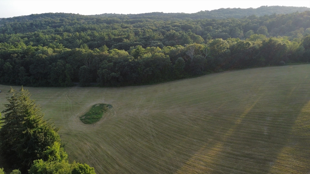 50 Town Farm Road North Brookfield, MA 01535 - Photo 3 of 4 a view of a lake with mountain