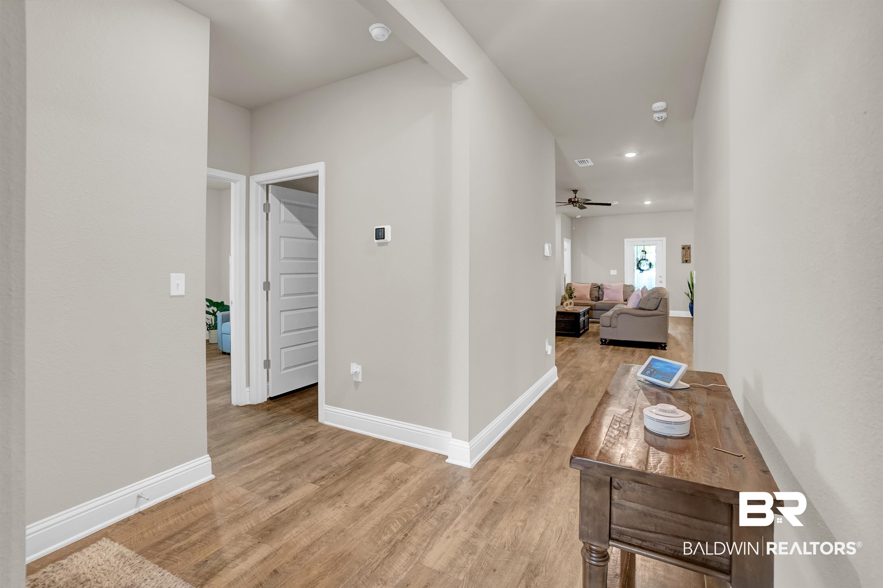 31671 Memphis Loop Daphne, AL 36527 - Photo 7 of 51 Corridor with baseboards, light wood-style floors, and recessed lighting