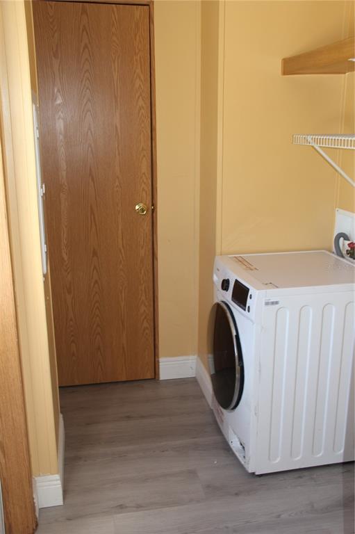 13201 Crowell Road Brooksville, FL 34613 - Photo 17 of 35 a utility room with dryer and washer