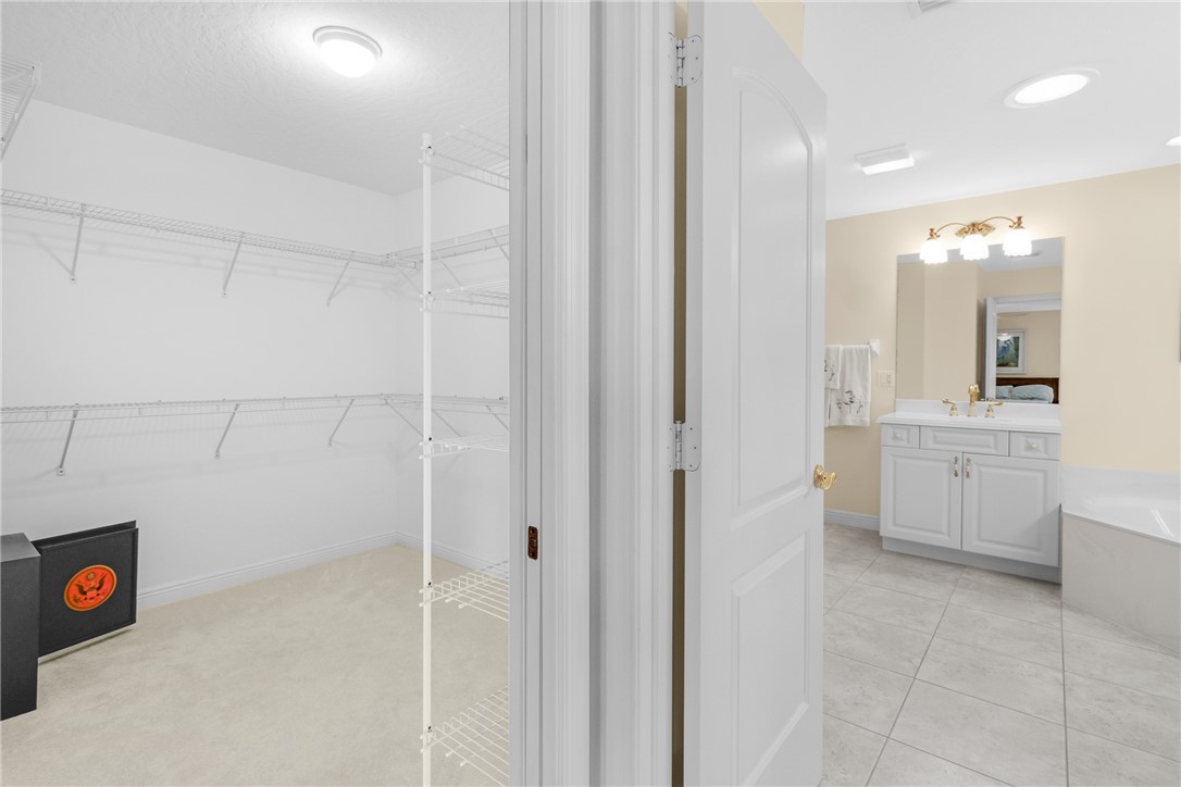 258 Main Street Sebastian, FL 32958 - Photo 16 of 32 a view of a storage & utility room with closet dryer and washer