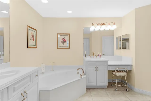 a bath room with a sink and a mirror