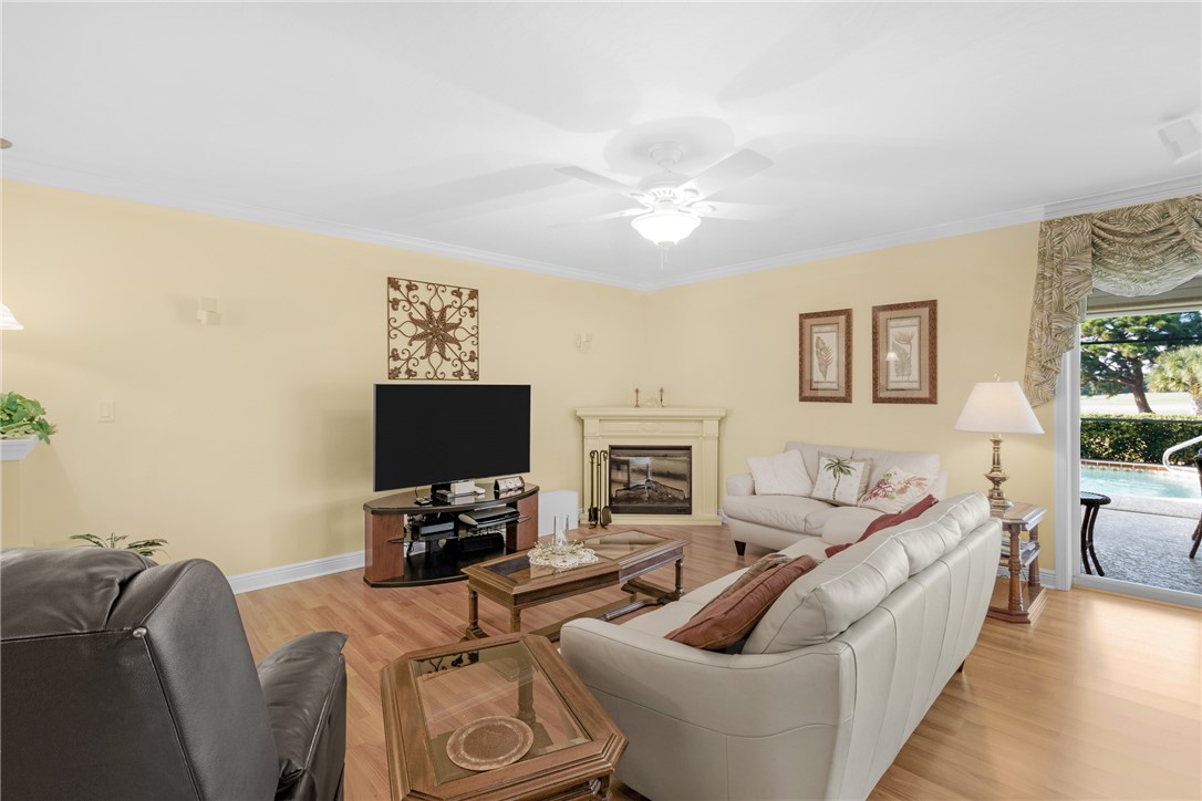 258 Main Street Sebastian, FL 32958 - Photo 5 of 32 a living room with furniture and a flat screen tv