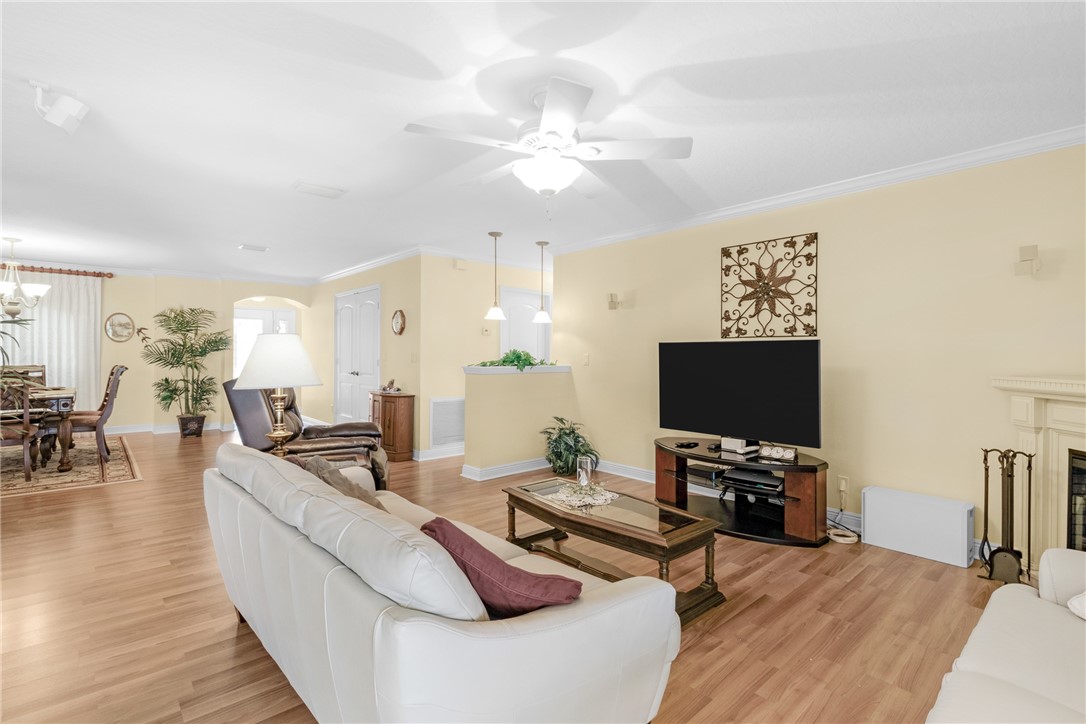 258 Main Street Sebastian, FL 32958 - Photo 7 of 32 a living room with furniture and a flat screen tv