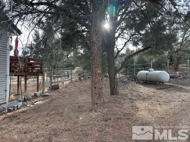 2391 Enterprise Road Reno, NV 89521 - Photo 5 of 15 a backyard of a house with table and chairs