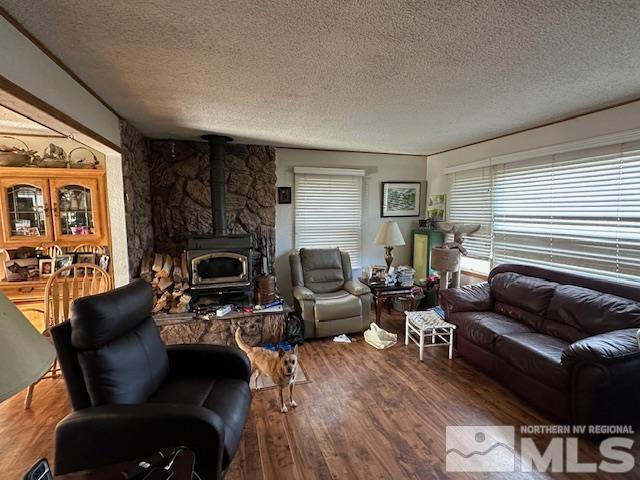 2391 Enterprise Road Reno, NV 89521 - Photo 8 of 15 a living room with furniture and a fireplace