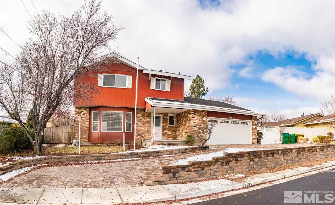 3255 Argo Way Reno, NV 89509 - Photo 1 of 25 a front view of a house with garden