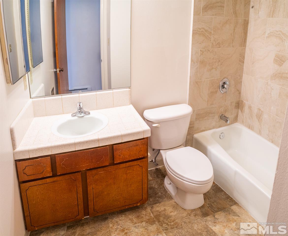 3255 Argo Way Reno, NV 89509 - Photo 21 of 25 a bathroom with a sink toilet and shower