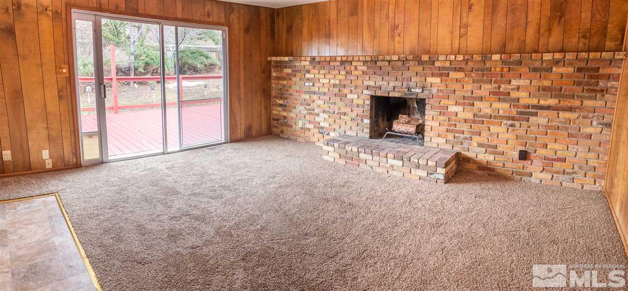 3255 Argo Way Reno, NV 89509 - Photo 8 of 25 a view of empty room with fireplace and window