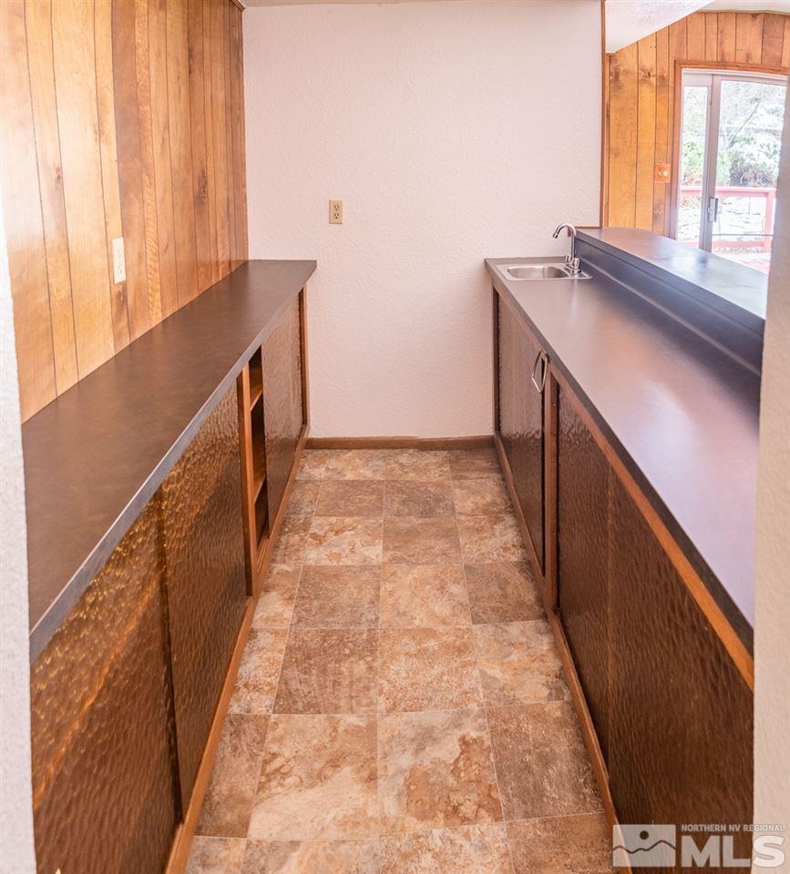 3255 Argo Way Reno, NV 89509 - Photo 10 of 25 a view of entryway with a window and wooden floor