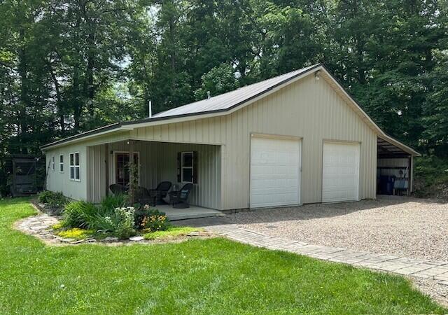 7751 Mulberry Road Heath, OH 43056 - Photo 8 of 70 NEAR 1,000 SF 4+ CAR HEATED GARAGE AND WORKSHOP