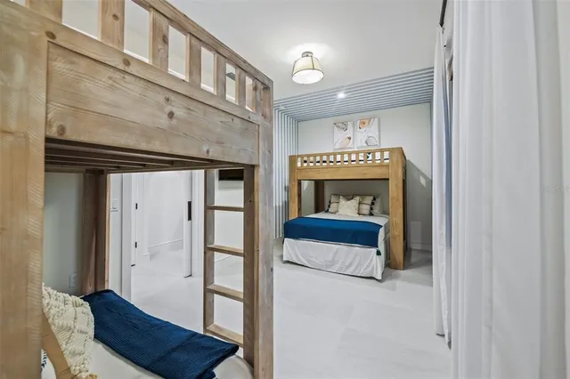 a view of an chairs and tables in the balcony