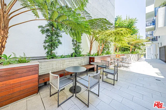 a bathroom with a tub and shower