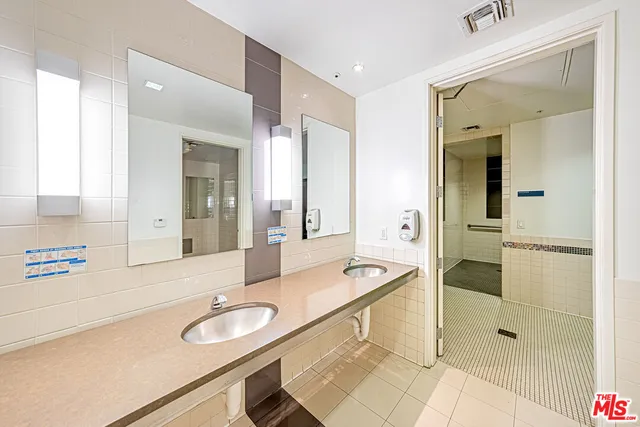 a view of an empty room and cabinet