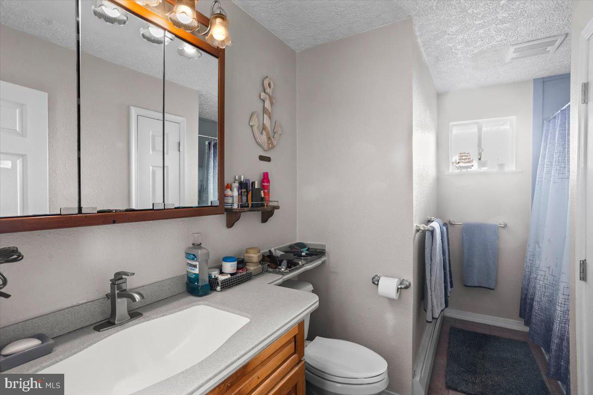 645 South 14th Avenue Lebanon, PA 17042 - Photo 19 of 67 a bathroom with a sink toilet and shower