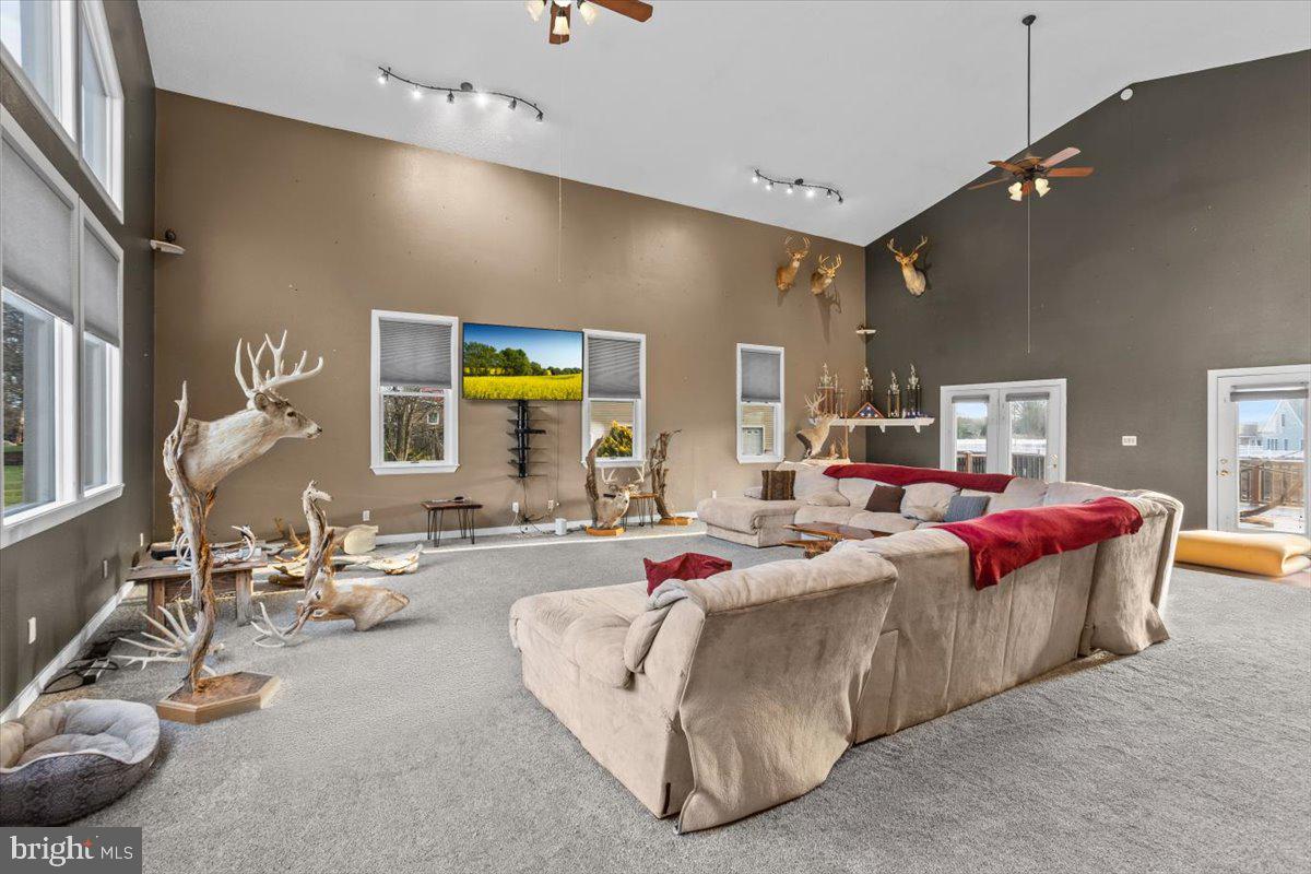 645 South 14th Avenue Lebanon, PA 17042 - Photo 28 of 67 a living room with furniture a flat screen tv and a large window