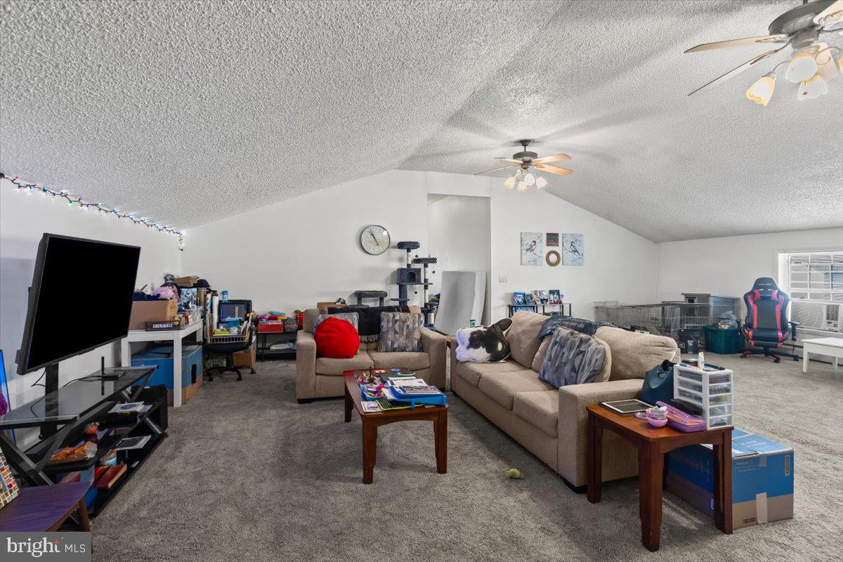 645 South 14th Avenue Lebanon, PA 17042 - Photo 49 of 67 a living room with furniture and a flat screen tv