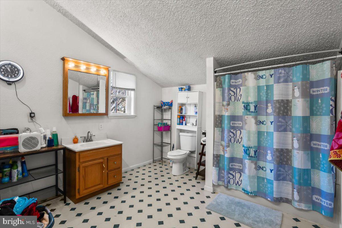 645 South 14th Avenue Lebanon, PA 17042 - Photo 52 of 67 a room with a baby crib and a wooden floor