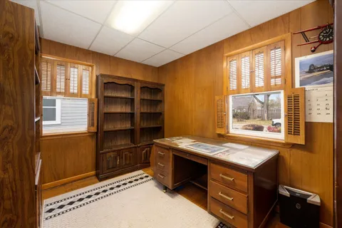 a room with storage and windows