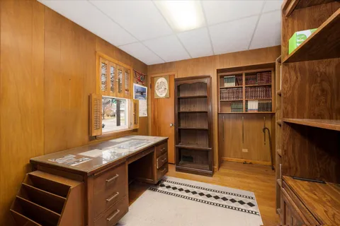 a kitchen with a stove and a cabinets
