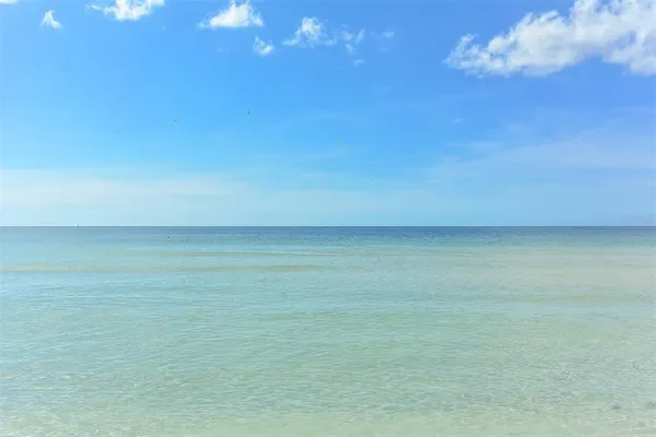 a view of a lake with a mountain