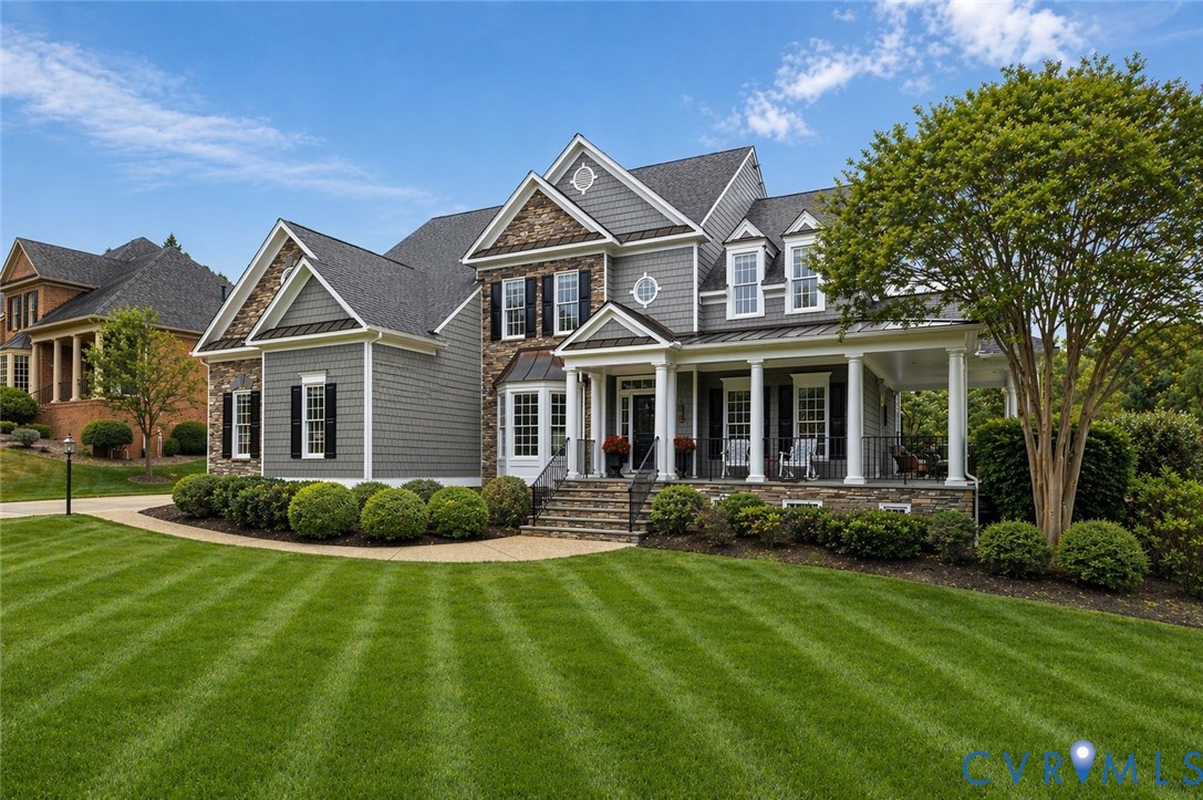 2613 Founders Bridge Road Midlothian, VA 23113 - Photo 2 of 3 a front view of a house with a yard
