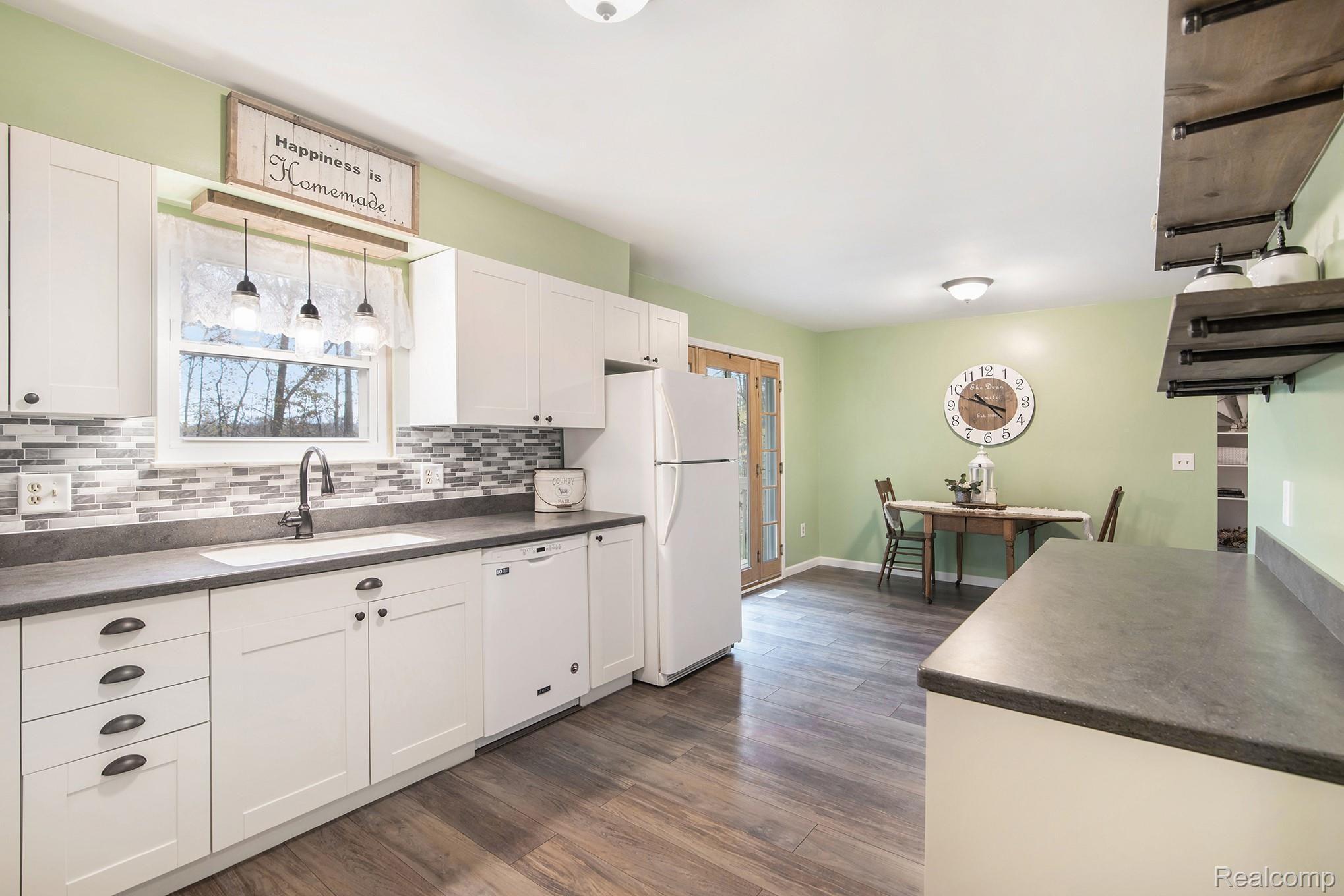 11750 Chase Lake Road Webberville, MI 48892 - Photo 7 of 22 Updated Kitchen with newer flooring
