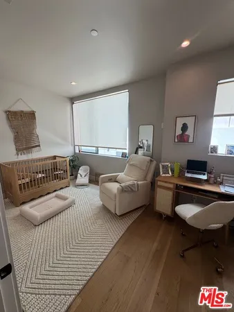 a bedroom with furniture and a couch