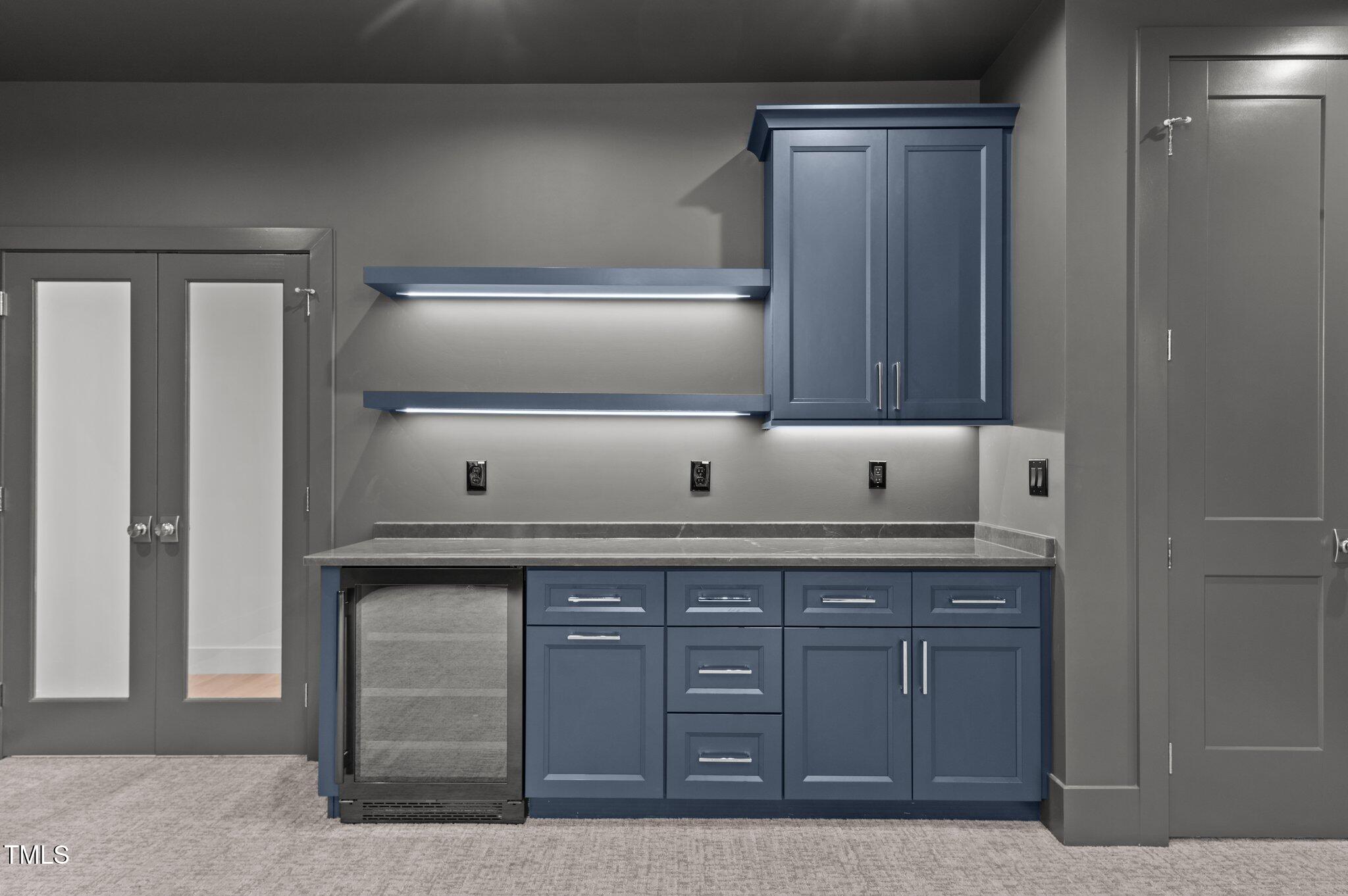 949 Harrison Ridge Road Wake Forest, NC 27587 - Photo 38 of 52 a kitchen with stainless steel appliances granite countertop a sink and cabinets