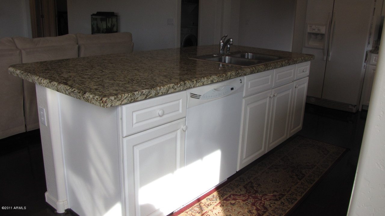 16007 West Pima Street Goodyear, AZ 85338 - Photo 11 of 35 a bathroom with sink and mirror
