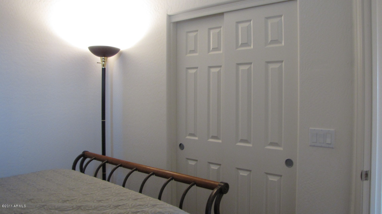 16007 West Pima Street Goodyear, AZ 85338 - Photo 15 of 35 a view of a hallway with closet