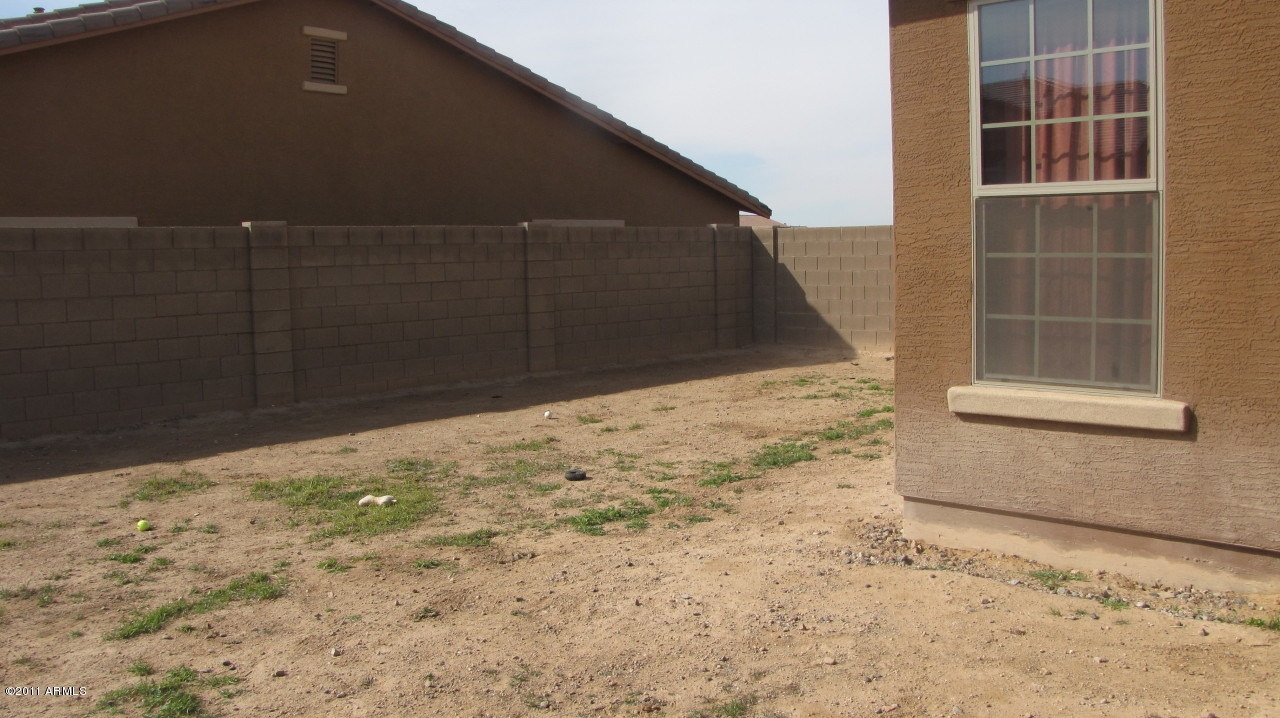 16007 West Pima Street Goodyear, AZ 85338 - Photo 26 of 35 a view of wooden fence