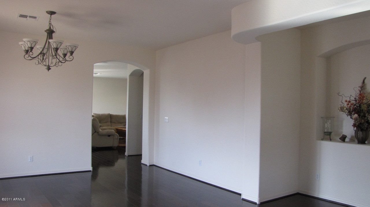16007 West Pima Street Goodyear, AZ 85338 - Photo 6 of 35 a view of a hallway with entryway