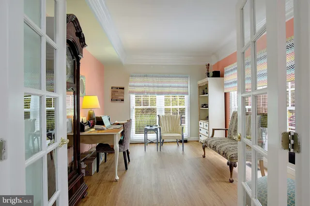 a view of a livingroom with furniture and a hardwood floor