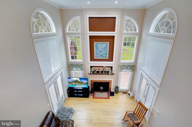 a bathroom with a sink a toilet a shower and a mirror