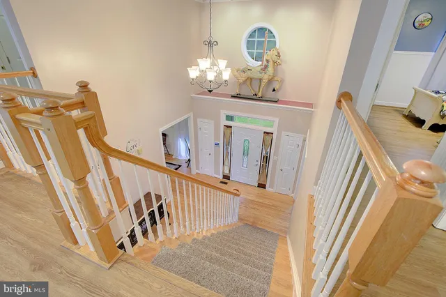 a bedroom with a bed and a book shelf