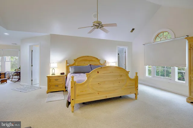 a very nice looking living room with furniture and a chandelier