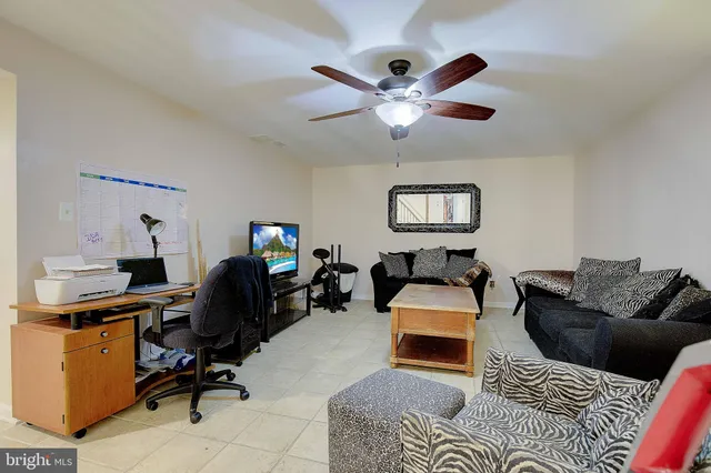 a view of a house with pool and a yard