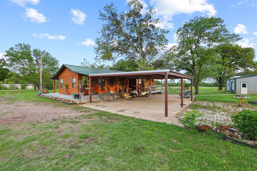 642 Earl Road Sadler, TX 76264 - Photo 26 of 40 a view of house with outdoor entertaining space