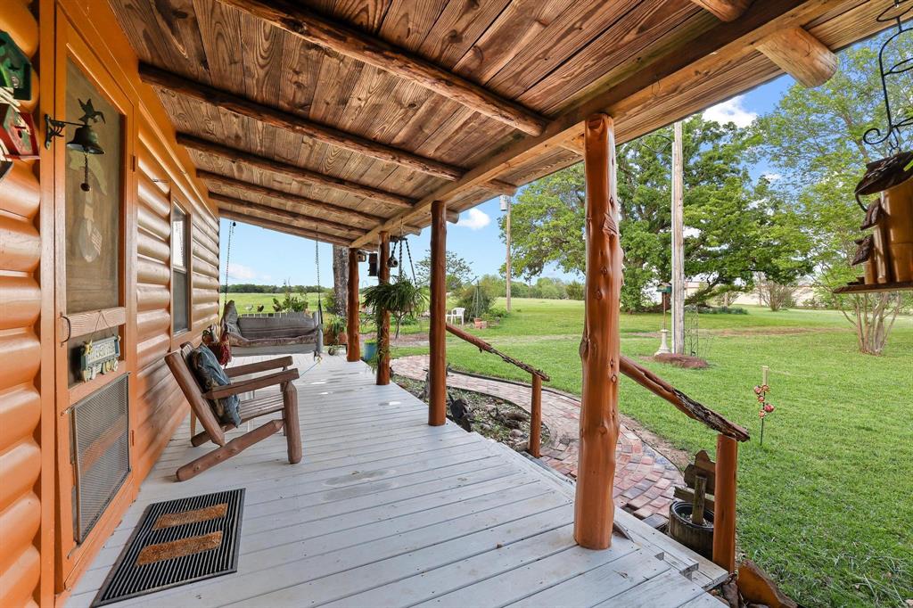 642 Earl Road Sadler, TX 76264 - Photo 5 of 40 a view of a deck with wooden floor and outdoor space
