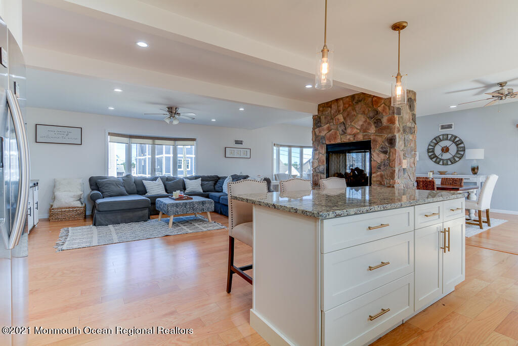7 Queen Ann Road Brick, NJ 08723 - Photo 13 of 52 Two sided fireplace